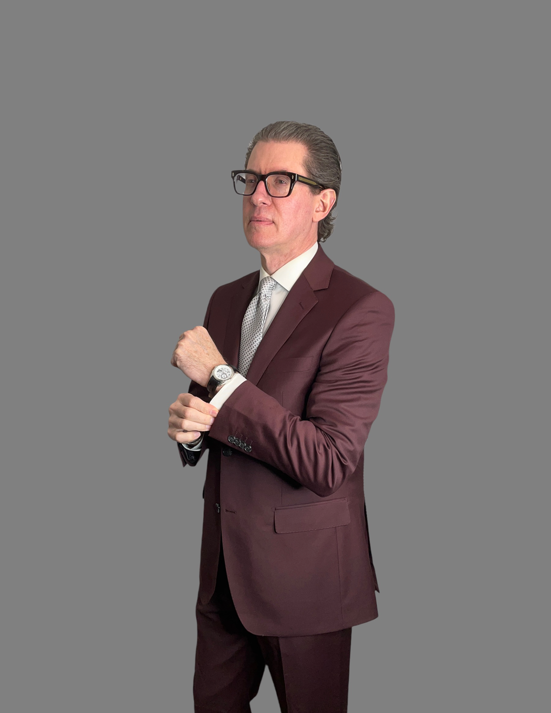 burgundy suit with shirt sleeves showing