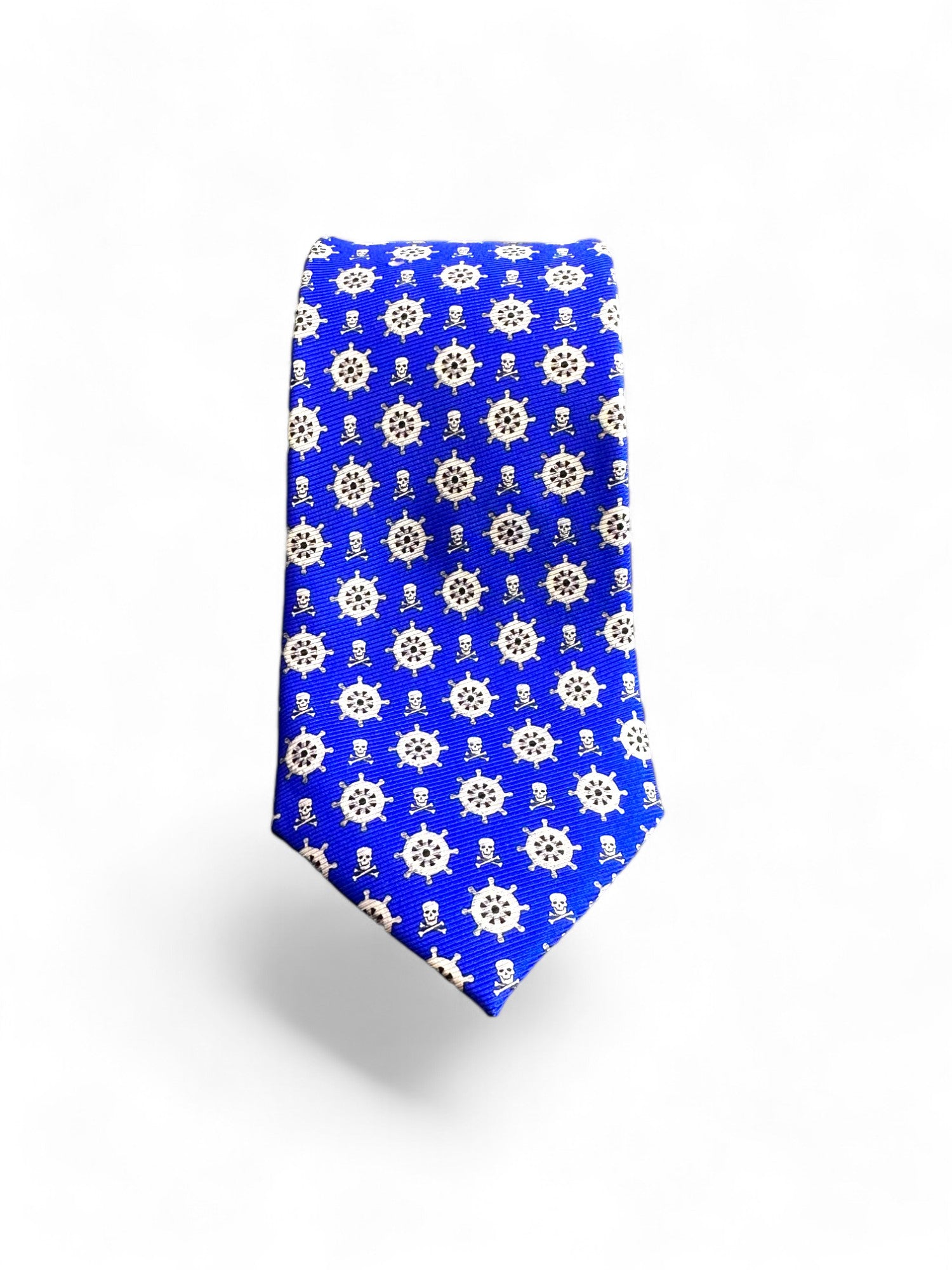 Dress to impress with the SUITCAFE Silk Twill Tie. Crafted from 100% handmade silk, this necktie features a sophisticated geometric pattern in stone grey and cobalt blue. Its ship's wheel sailor theme adds a touch of elegance to any outfit. Elevate your style with this exclusive accessory.