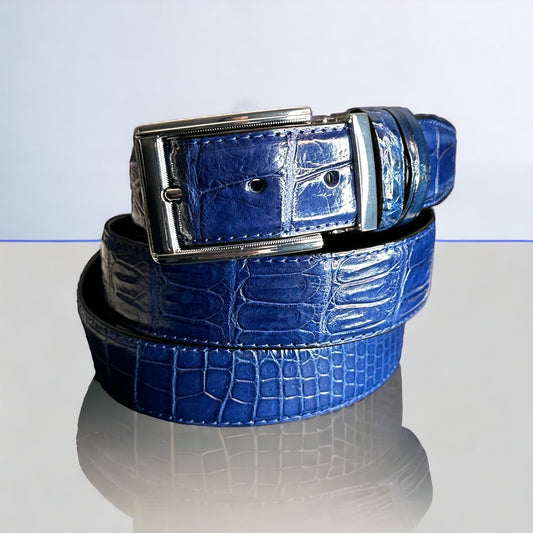 This handmade navy blue natural skin belt in crocodile serves as the standard for men's belts for suits. What is so great about this type of skin is that it fits with any outfit even jeans. With the supplied gold square and nickel square buckles, you get to choose what look you need for any type of event. Adjustable. Interchangeable buckles..