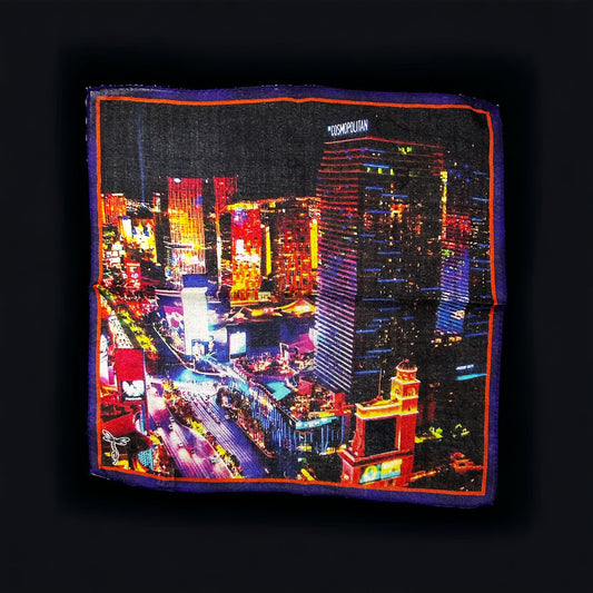 New designs in beautiful and colorful pocket square for your new sport jacket or suit. Adding color and casualness to any outfit these pocket squares depict different exotic cities across the world. Here we have the Las Vegas strip showing the Cosmopolitan Hotel and Casino. Hand rolled edge. Made in Italy. 14 x14 inches.
