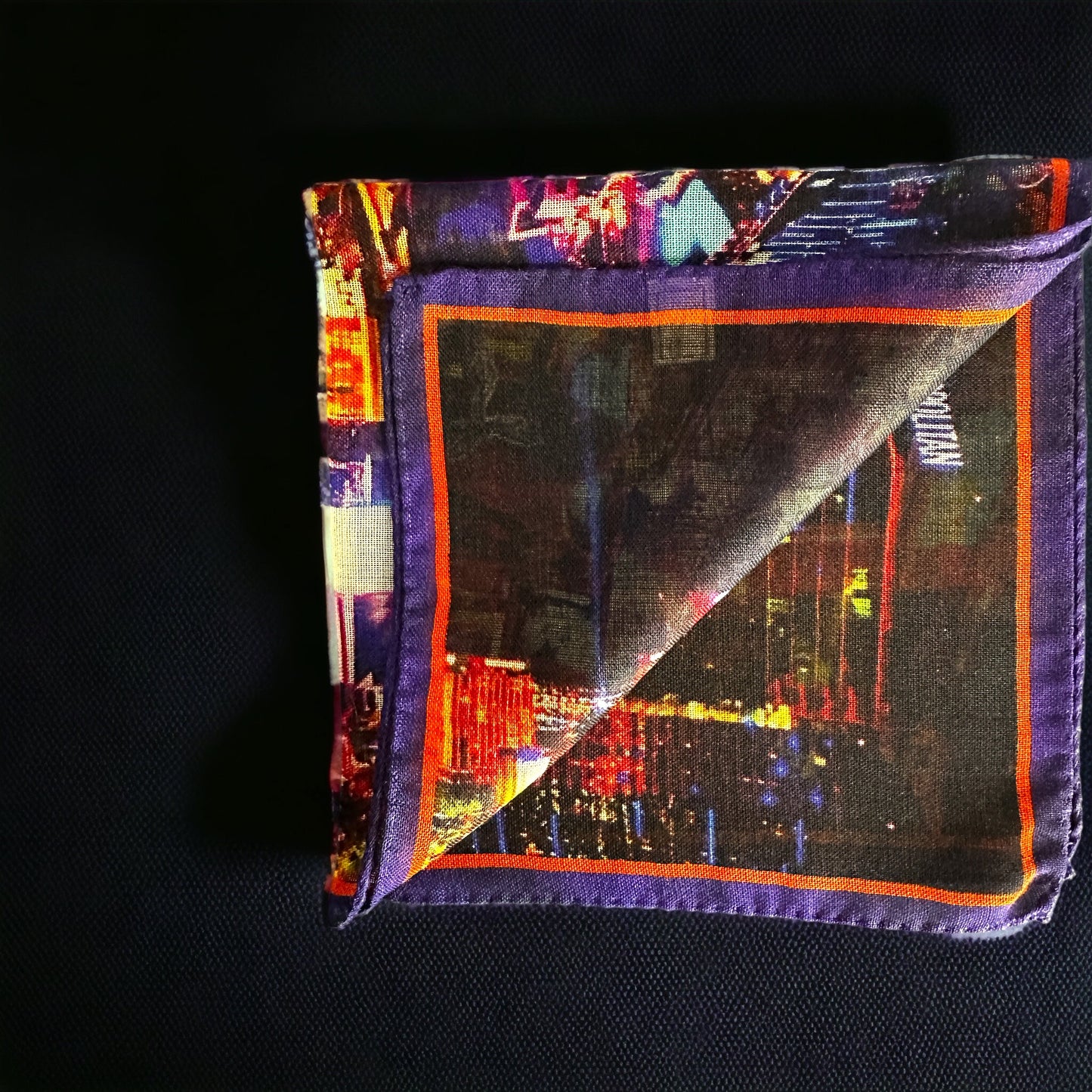 New designs in beautiful and colorful pocket square for your new sport jacket or suit. Adding color and casualness to any outfit these pocket squares depict different exotic cities across the world. Here we have the Las Vegas strip showing the Cosmopolitan Hotel and Casino. Hand rolled edge. Made in Italy. 14 x14 inches.